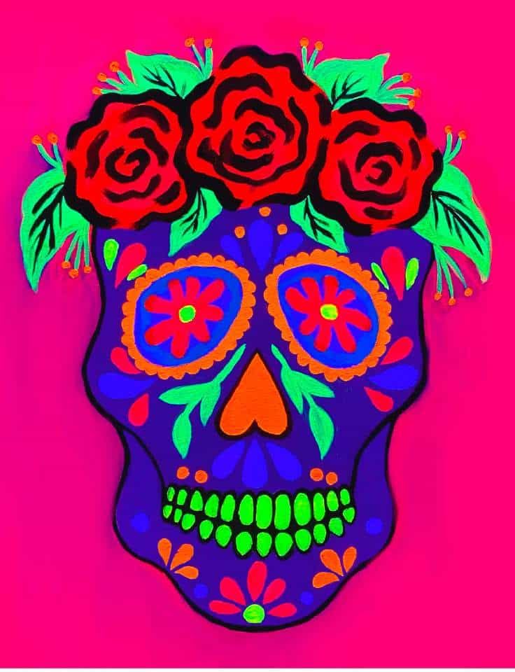 a glowing skull with flowers on it's face and head is Pinot & Picasso's artwork Neon Nights Day of the Dead
